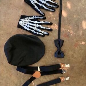 Child’s paperboy cap, suspenders, skeleton gloves, bow tie